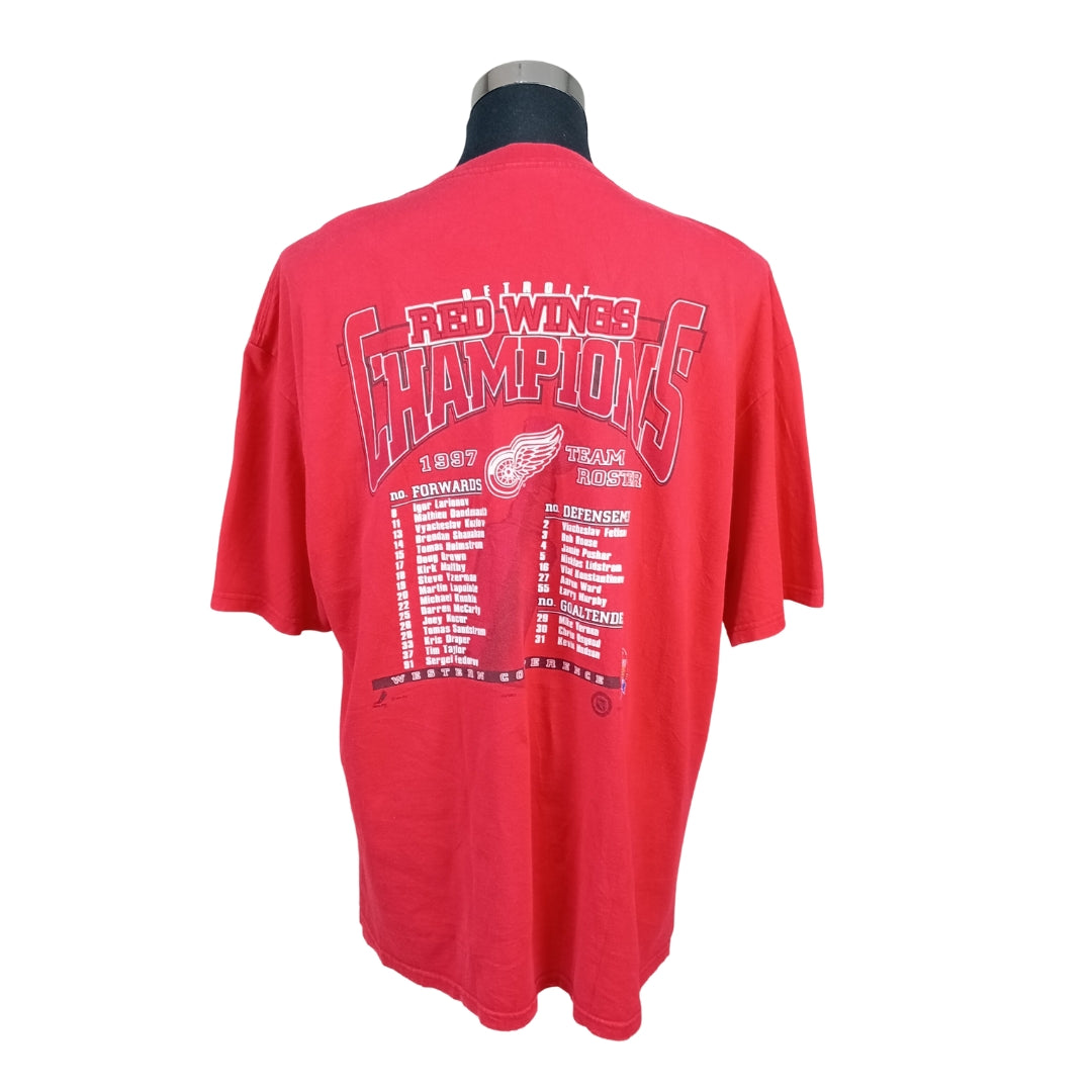 Detroit Red Wings 1997 Stanley Cup Champions Tee: Celebrate a Historic Victory"  Introducing the Detroit Red Wings 1997 Stanley Cup Champions Tee, a must-have for die-hard hockey fans looking to commemorate one of the most iconic moments in NHL history. This tee is not just clothing; it's a timeless reminder of the Red Wings' remarkable championship win.
